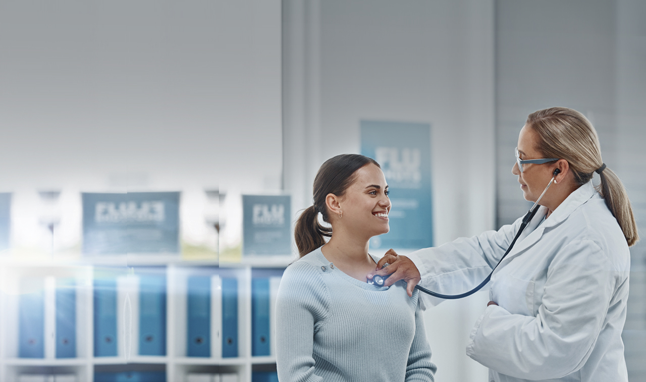 Doctor checking a patient with a stethoscope