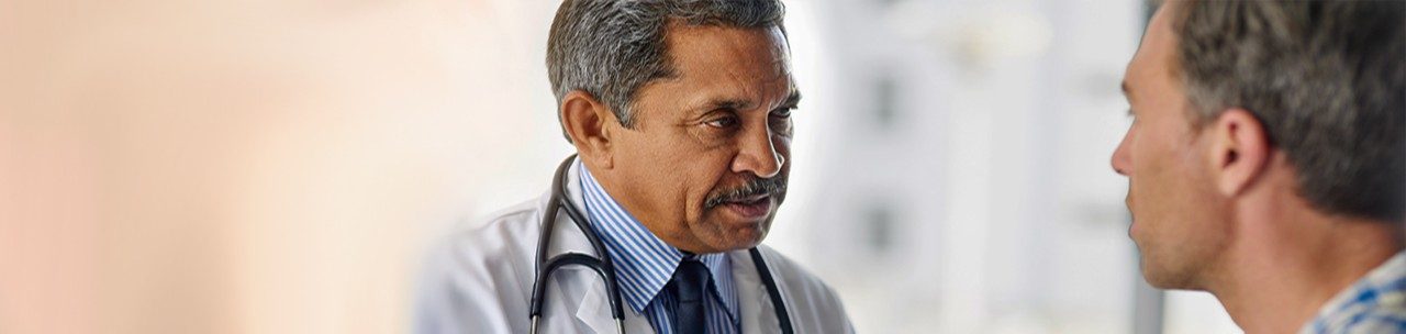 Cropped shot of a doctor a giving his patient advice during a consult