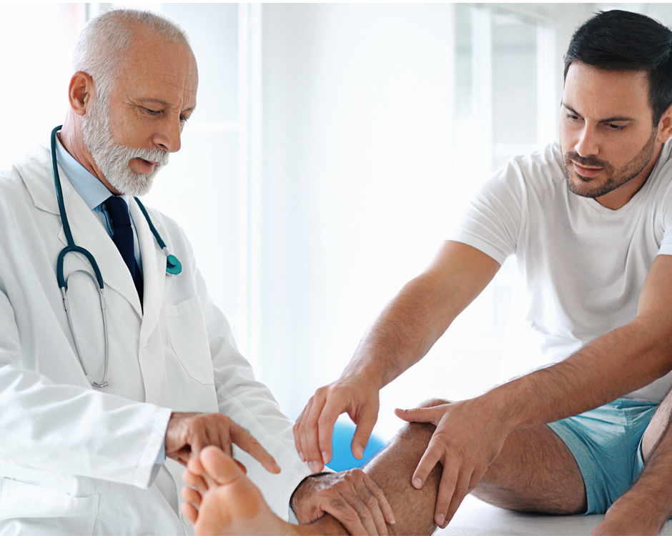 Podiatrist examining foot