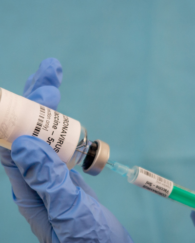 extracting vaccine into a syringe