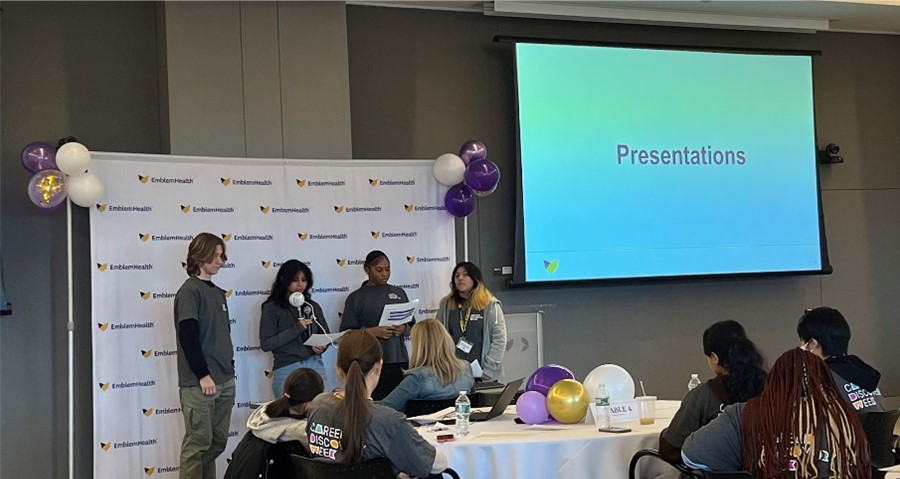 Students from James Madison High School present their ideas and strategies on improving teen health to EmblemHealth and AdvantageCare Physicians company leaders and fellow students.
